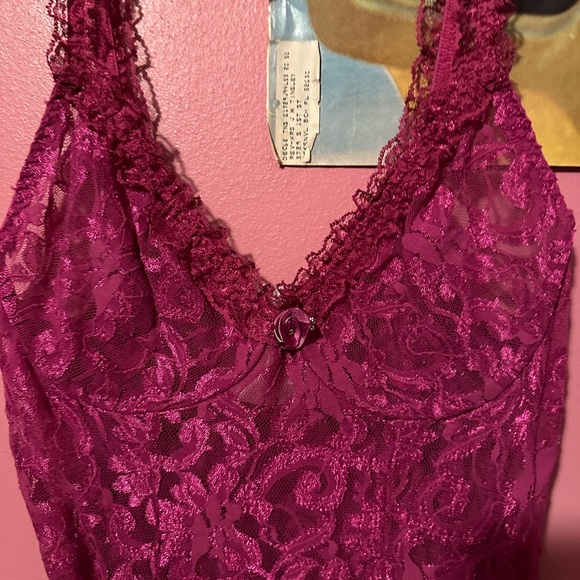 Sheer lace dress with flower and ruffle details. The bust has underwire. - Picture 4 of 4